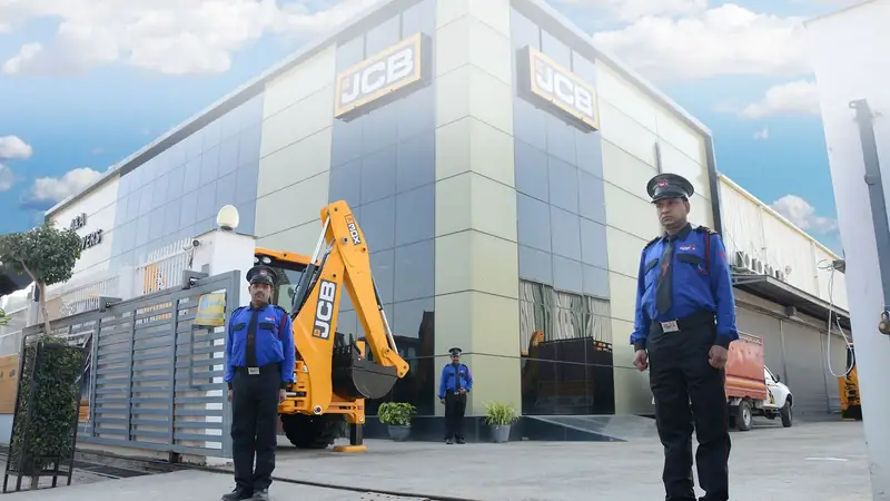Guards at a vehicle dealership, Business premises · day shift